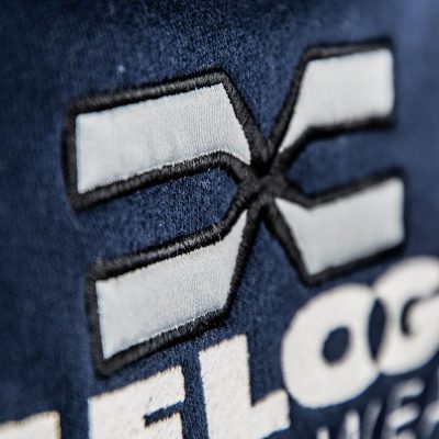 FEFLOGX Sportswear 1/4-Zip-Sweater, Detail Logo-Stick nah.