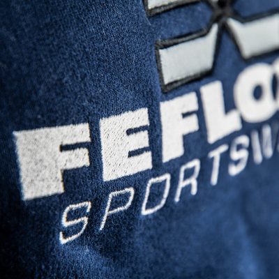 FEFLOGX Sportswear 1/4-Zip-Sweater, Detail Logo-Stick.