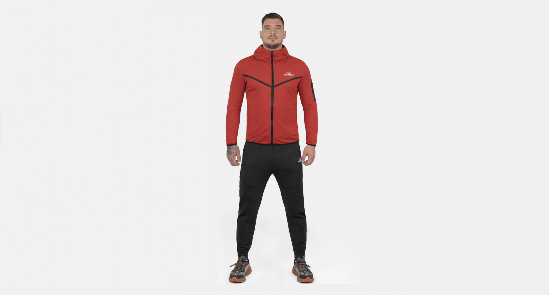 FFX Superior Jogginganzug Absolute Power von FEFLOGX Sportswear, vordere Ansicht mit rotem Oberteil und schwarzer Jogginghose mit Reißverschlusstaschen in Hose und Oberteil, Trainingsanzug Herren Jogginganzug Damen, High-Grade Tracksuit, super bequemer Sport Anzug (1).